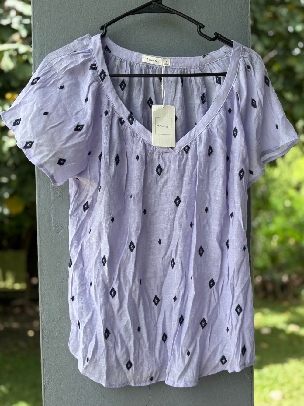 Active USA Lavender V-Neck Short Sleeve Top with Black Diamond Motif